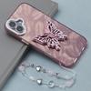For iPhone 16 Case Butterfly Kickstand PC+TPU IMD Phone Cover with Lens Film / Beaded Strap - Feather Pattern / Pink