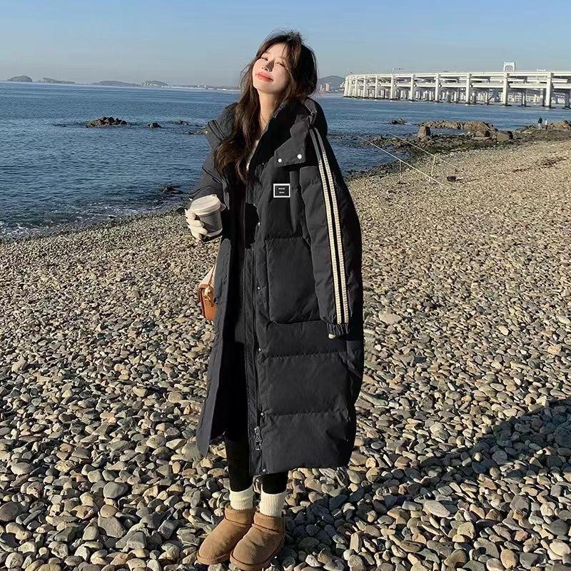 Оставайтесь в тепле и выглядите модно с женским пуховиком длиной до колена из хлопка с подкладкой