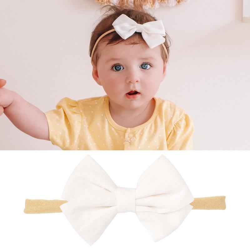 Комплект детских повязок на голову из нейлона и хлопка: Повязки на голову из льна и банта в подарочной коробке.