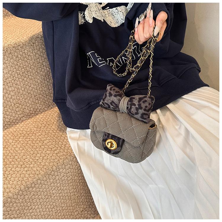 Новая женская сумка с ромбовидным бантом.