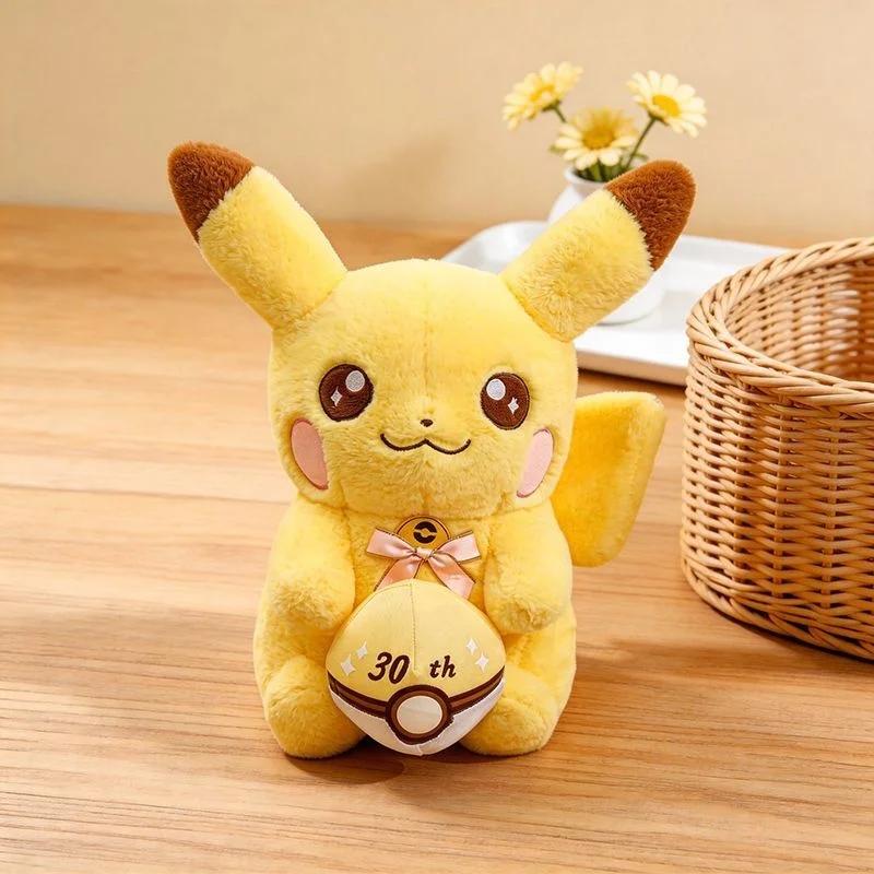 Soft Fluffy Anniversary Pikachu Stuffed Doll Holding Poke Ball Bow Design 3550Cm Anime Plush Toy For Sofa Ornament Fans Gift