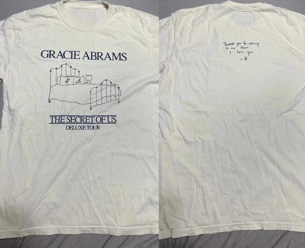 The Secret Of Us Deluxe Tour T-Shirt Cream Lollapalooza 2025 ON TREND Unisex T-Shirt