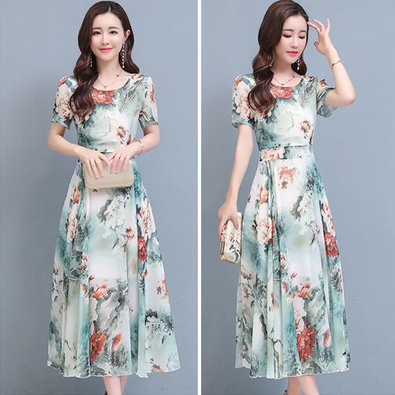 New Elegant Floral Fashion Dress Women's Summer Fashion Cover Belly Slim Long Flowing Dress Beach Skirt.