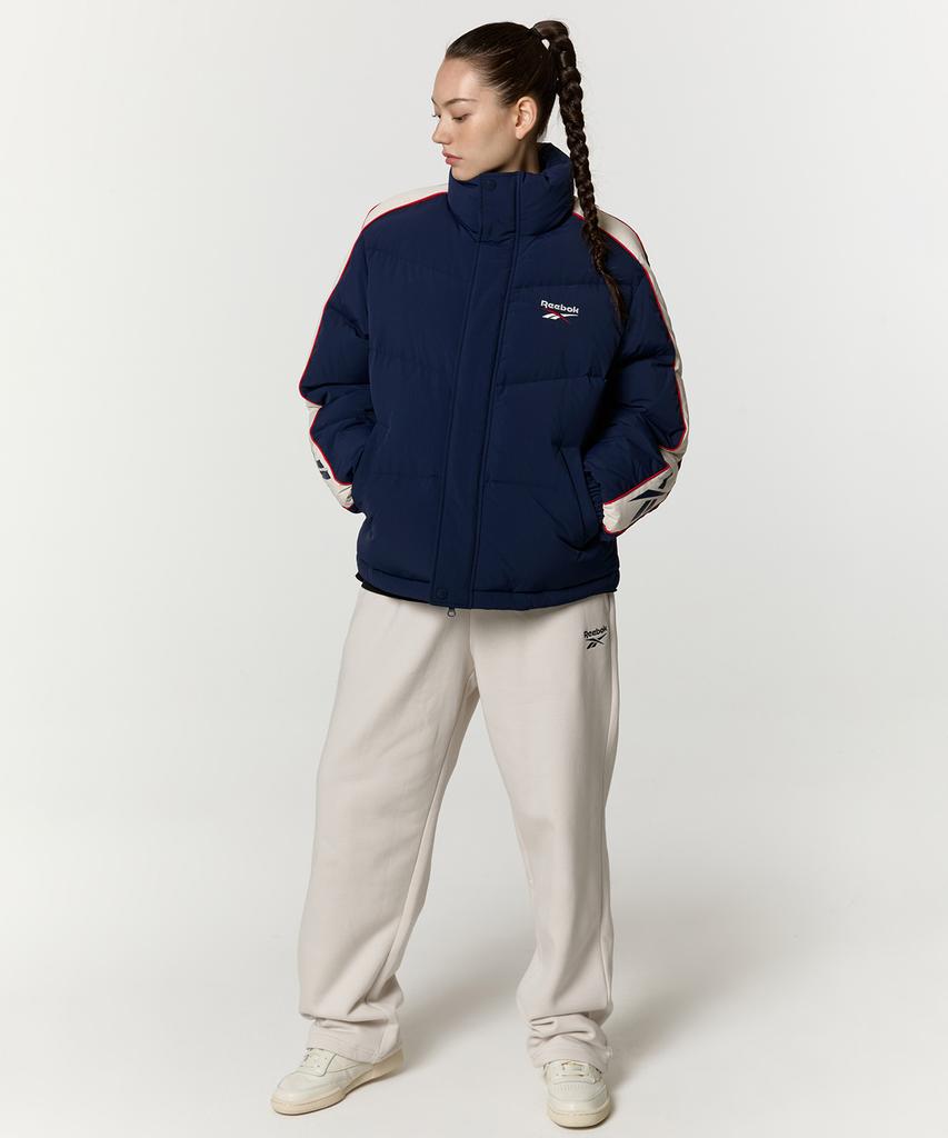 Reebok Классическая стеганая куртка Vector с панелями - Темно-синяя