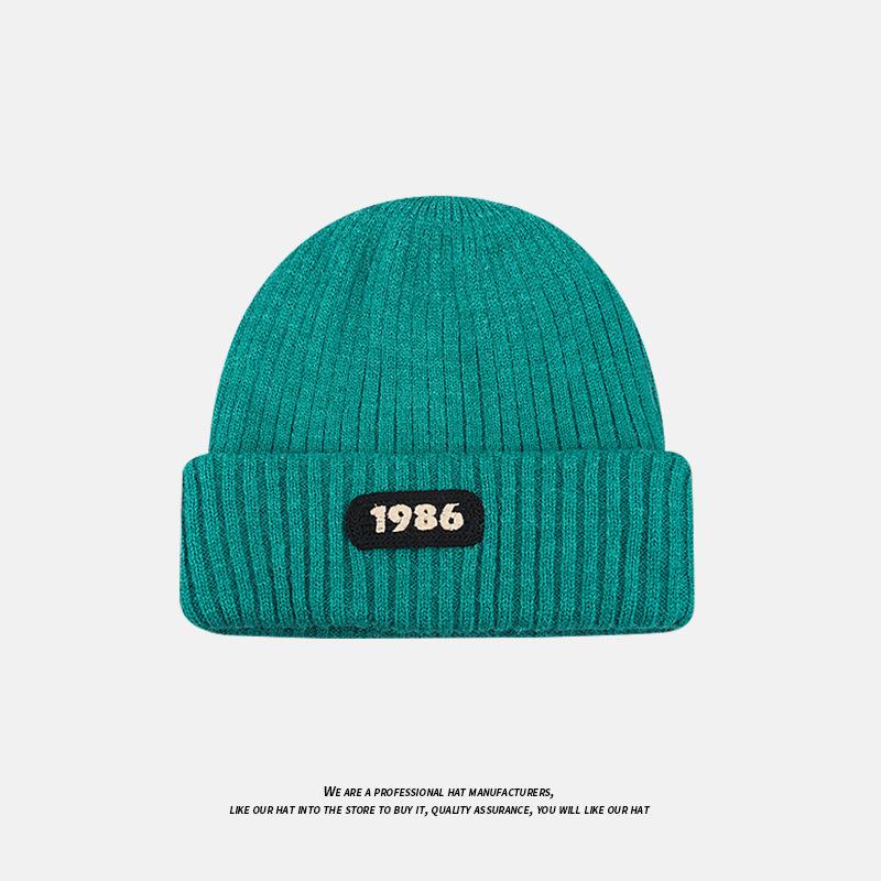 Осенне-зимняя мода Универсальная вязаная шапка Большой окружности головы Теплая защита ушей Шерстяная шапка Пара Холодная шапка