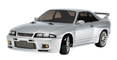 Tamiya Электрический радиоуправляемый автомобиль серии Nissan Skyline R33 Drift Spec 58604 1/10 No.604 GT-R (Шасси ТТ-02Д) На дороге