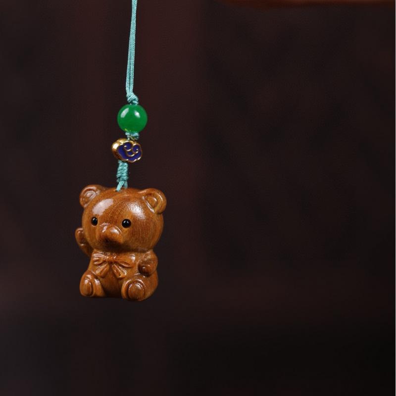 Twelve Zodiac Animal Charms Green Sandalwood Set: Rat, Ox, Tiger, Rabbit, Dragon, Snake, Horse, Sheep, Monkey, Rooster, Dog, Pig.