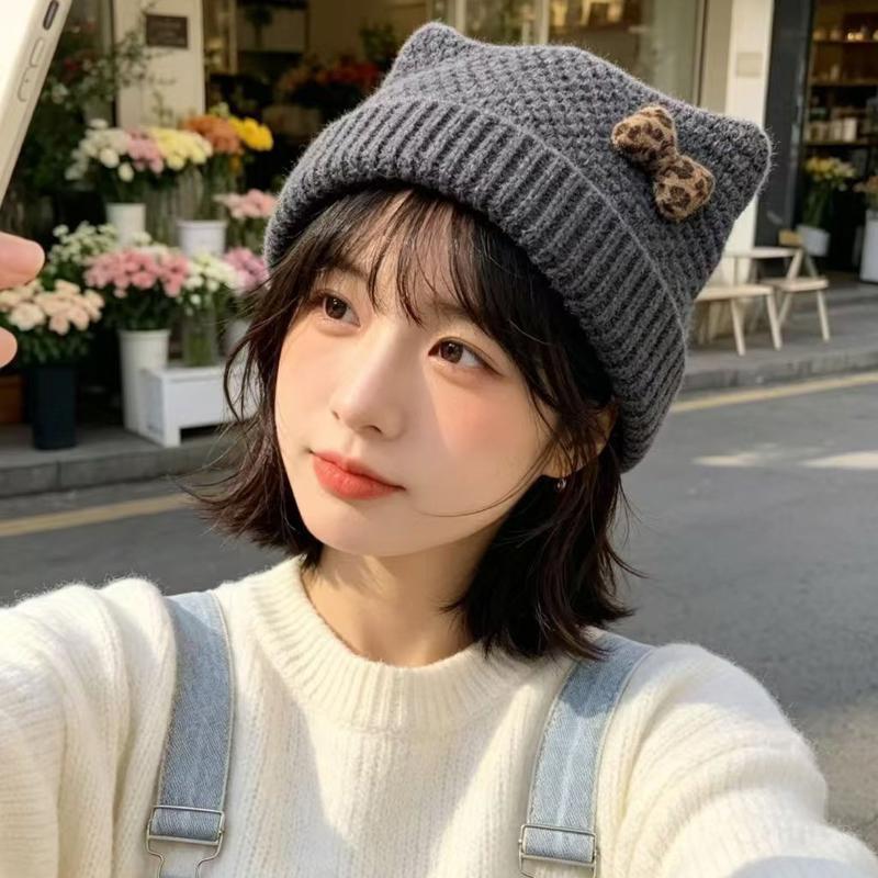 Autumn and winter leopard print bow cold hat women's waffle flanged wool hat retro sweet warm knitted hat