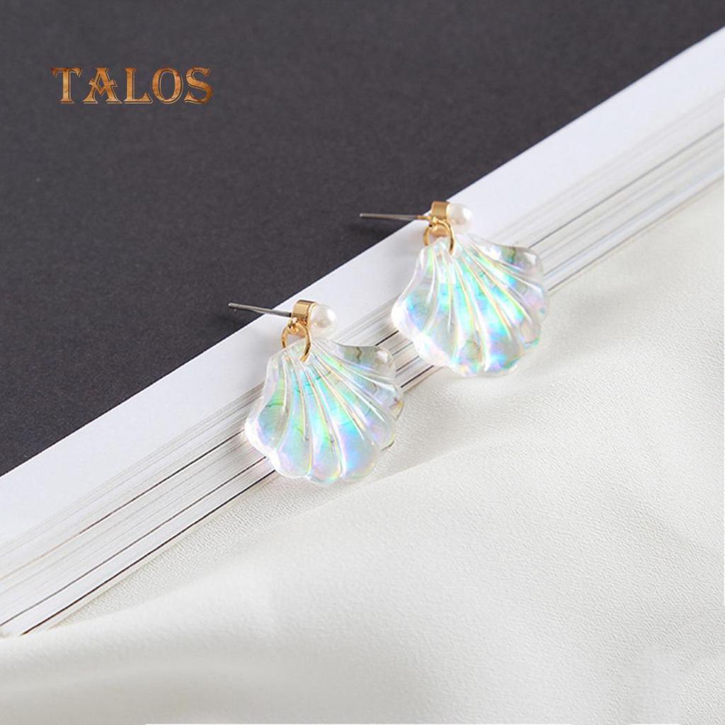 Серьги шпилька.В форме жемчужной ракушки