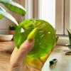 Сражайтесь со стрессом и гневом с этой игрушкой-пищалкой в виде зеленого яблока, эффективной антистрессовой игрушкой для друзей.