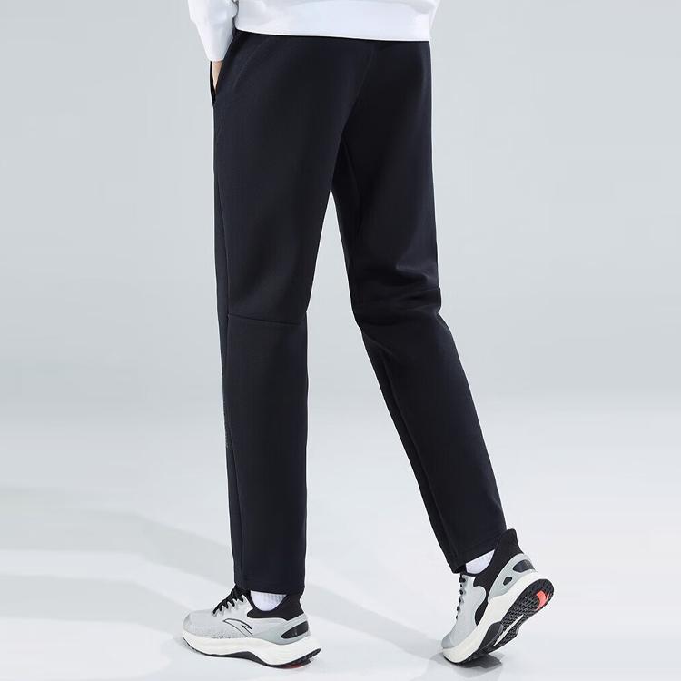 Anta Тренировочная серия однотонные повседневные спортивные длинные брюки с буквенным принтом мужские низы черного цвета 152317315-1