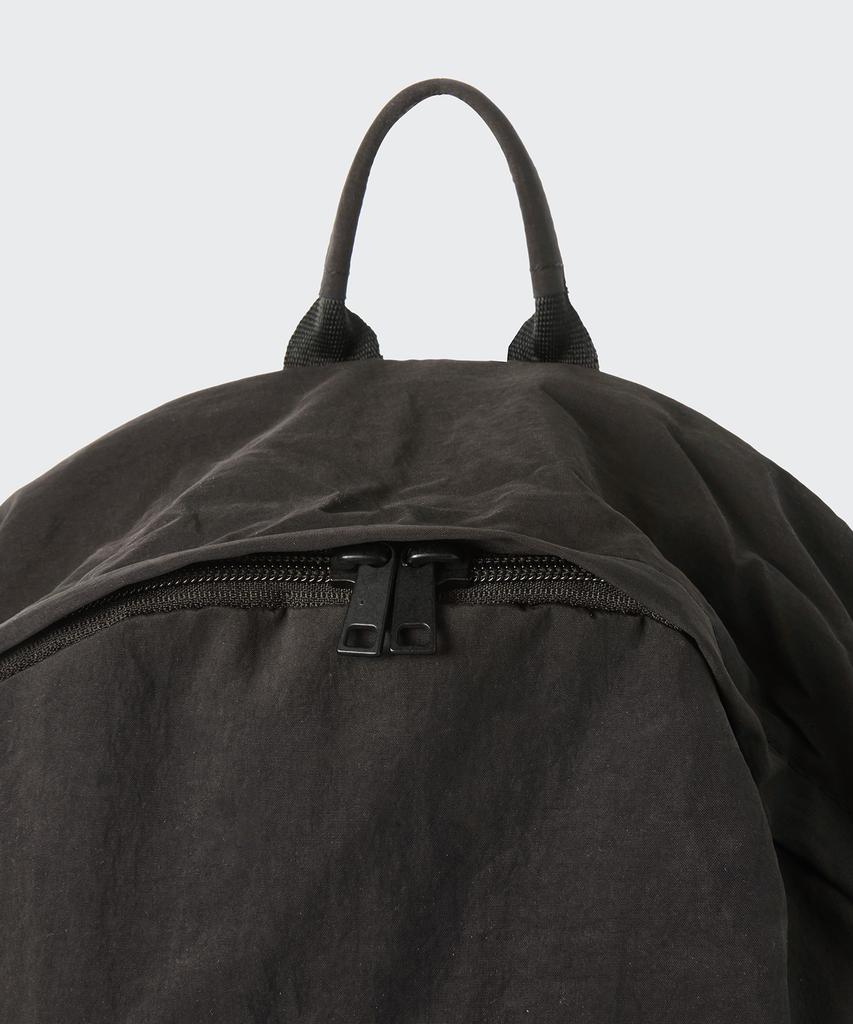 Musinsa Standard Crinkle Round Pocket Backpack [Dark Brown]