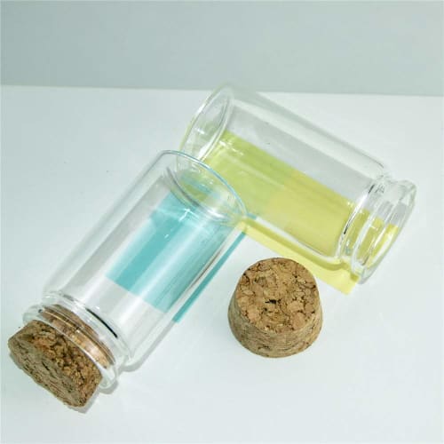 12 50ml clear glass bottles suitable for storing candy flavoring powders and liquids.