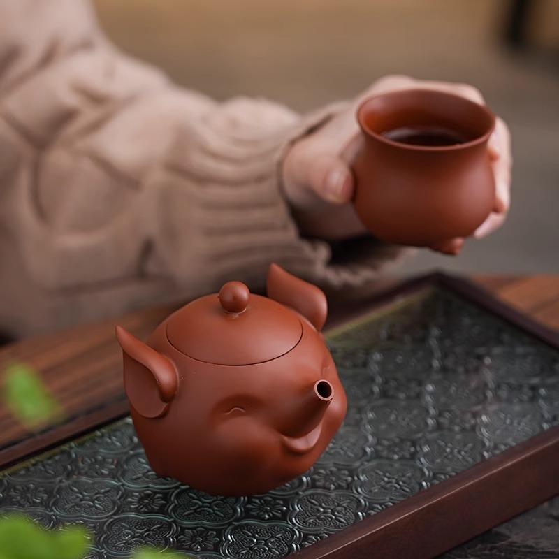 Purple pottery little flying pig teapot retro creative household ceramic tea hand grab pot kung fu travel tea set can be printed