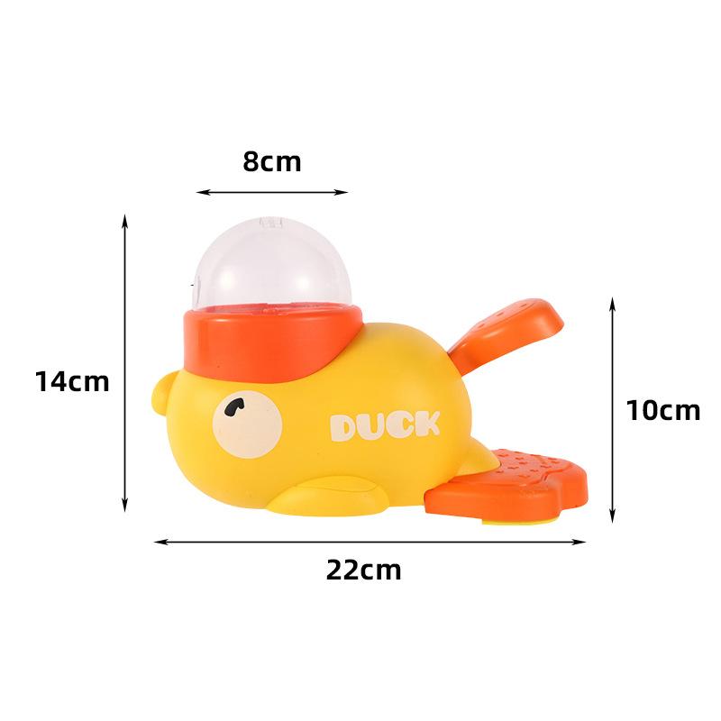 Маленький желтый утенок наступает на устройство для кормления, Игрушка для тренировки щенка расширяет энергию, Сублимированная пусковая установка, Собака высыпает корм