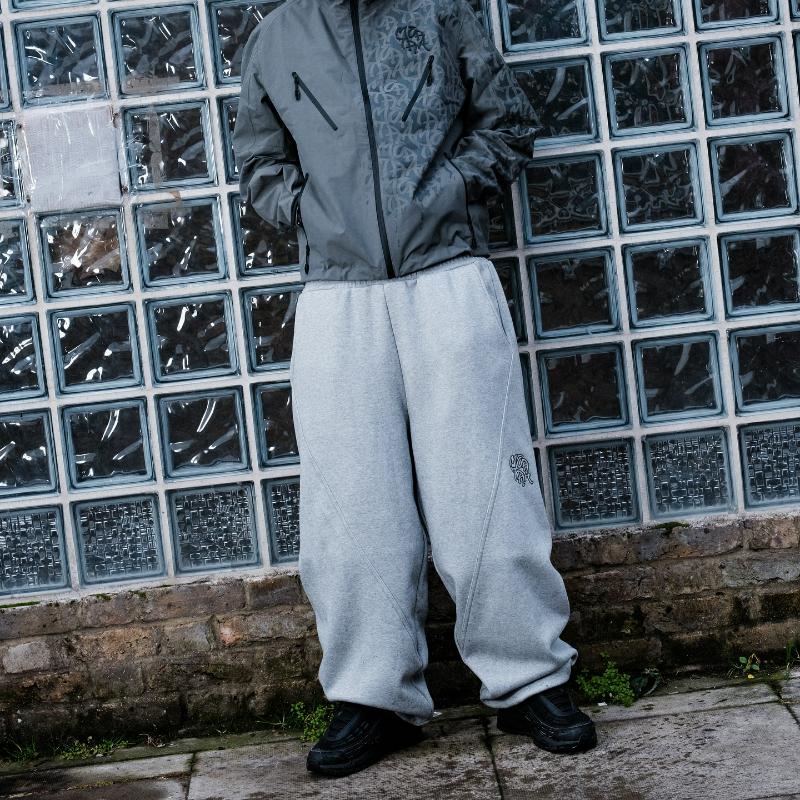 RogueWave Y2K Модные джоггеры Уличный ретро Обтекаемые швы Вышитый логотип Унисекс Спортивные штаны Хип-хоп Харадзюку Оверсайз Повседневные брюки