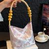 Осень 2025 Вышитая женская сумка-тоут под мышкой: Универсальный повседневный стиль ведра на плечо