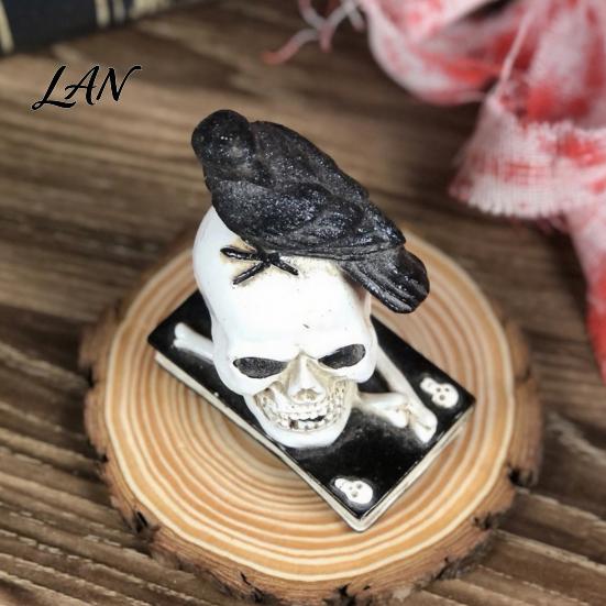 Mysterious Book Shelf Figurine Mystical Raven on Skull Statue, Gothic Crow Perching Resin Skeleton Statue with Book, Spooky Halloween Sculpture