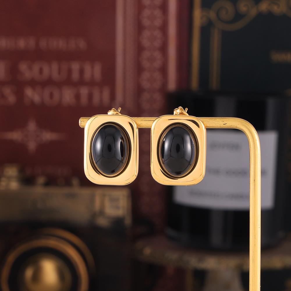 Серьги из титановой стали с золотым покрытием и инкрустацией из черного стекла