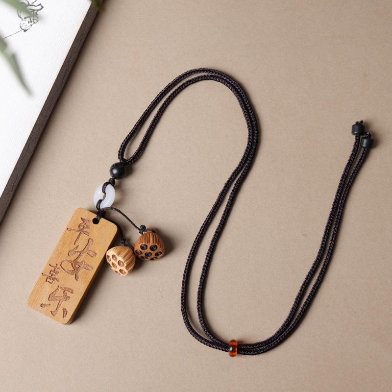 Jujube Wood Carved Mountain Ghost Necklace with Bagua Buckle and Seven Star Coin Pendant