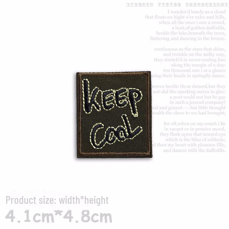 Yixiu Embroidered Black Small Badge: Trendy Clothing Decoration Patch