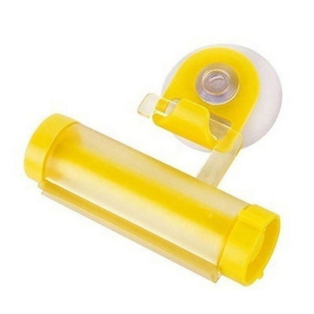 Plastic Device - A Suction Cup Press for Convenient Storage and Uniform Squeezing of Toothpaste Tubes