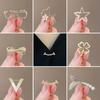 Bow High-end Anti-light Brooch Female High-end Sense Pin Anti-light Buckle Artifact Fixed Clothes Versatile Corsage