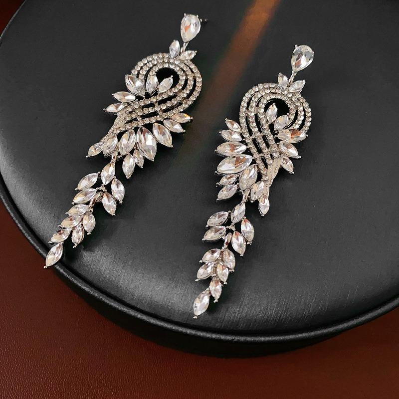Серьги-подвески с серебряной иглой, бриллиантовым цветком, каплей воды и кисточкой, преувеличенные серьги, легкая роскошь, премиальные серьги для женщин