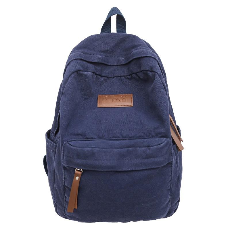 New denim canvas labeled fashionable four-season backpack Japanese and Korean casual large-capacity backpack