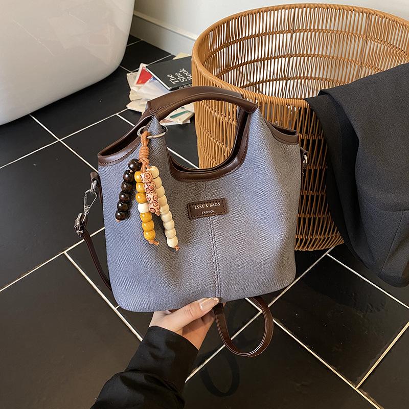 Премиальная женская сумка 2025 новая модная дорожная сумка на плечо, повседневная универсальная сумка-мессенджер, сумка-ведро