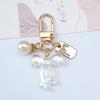 Llavero con lazo de perla elegante para mujer y niña, colgante para llavero de coche, bolso, accesorios, joyería DIY, regalos.