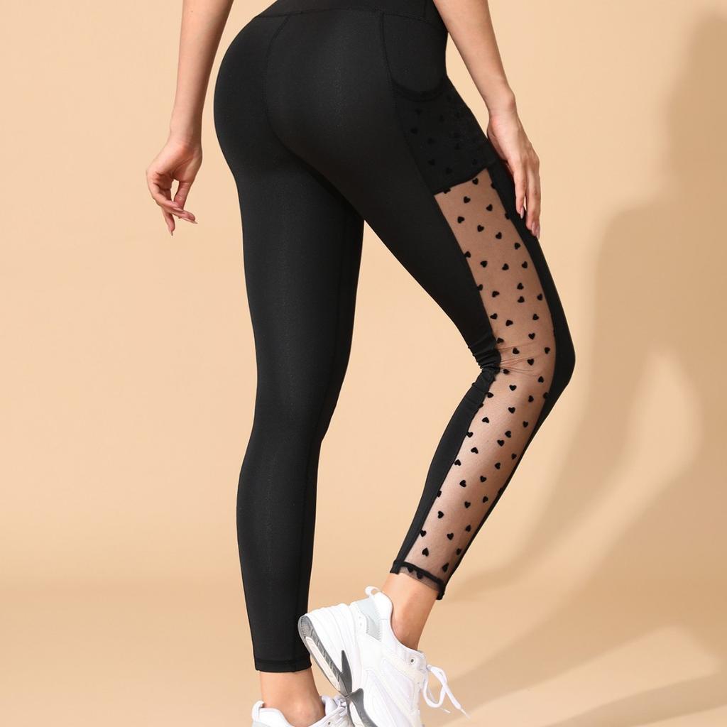 Yoga pants new hot style sports outdoor nine-point pants buttocks splicing mesh pocket tights for women