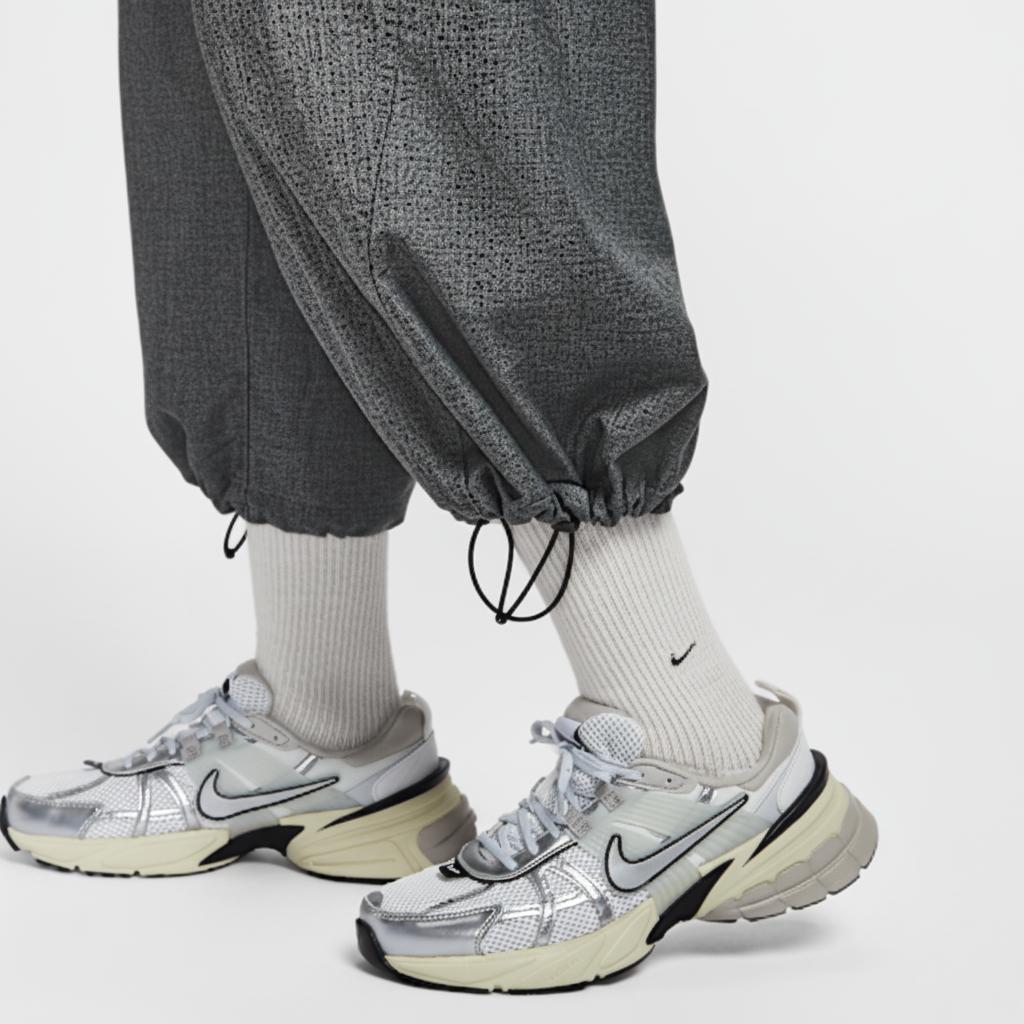 Nike Однотонные повседневные брюки средней посадки на кулиске Женский низ IF5454010