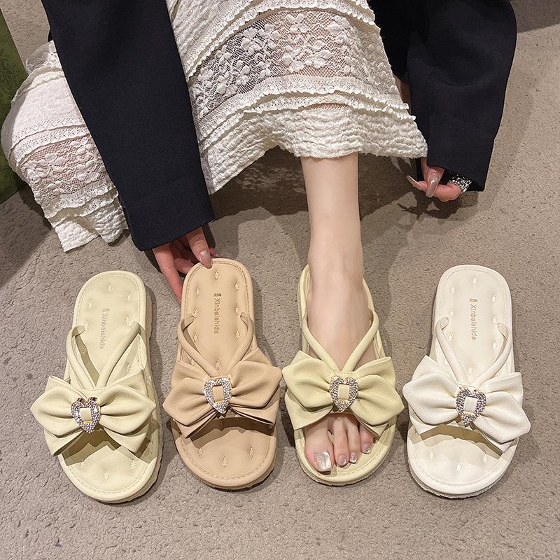 2025 new Internet celebrity explosion stepping on shit feeling slippers female cool slippers female summer wear fairy wind bow