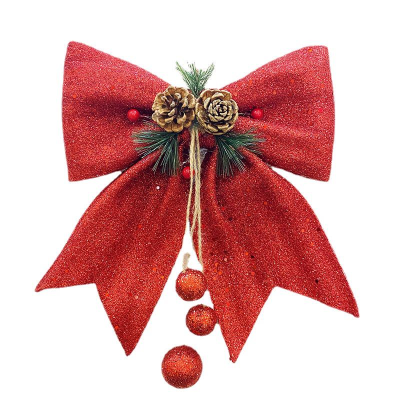 Золотой блестящий бант с украшениями: Большое, разноцветное рождественское украшение в виде елки