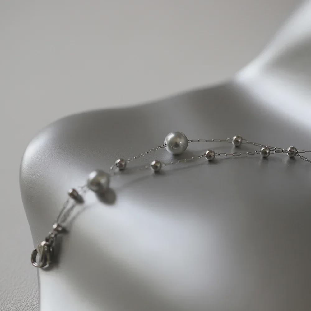 Браслет Interstellar Gray Whale Rain: Серебристо-серая жемчужная бусина ручной работы из титановой стали.