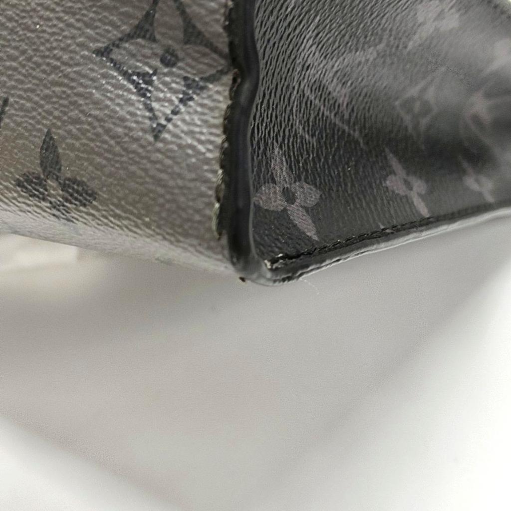 [Б/У] Pochette Voyage MM Классический холст с покрытием Monogram Кожа Taïga Косметичка Клатч Средний - Очень хорошее состояние #1FDGEI8