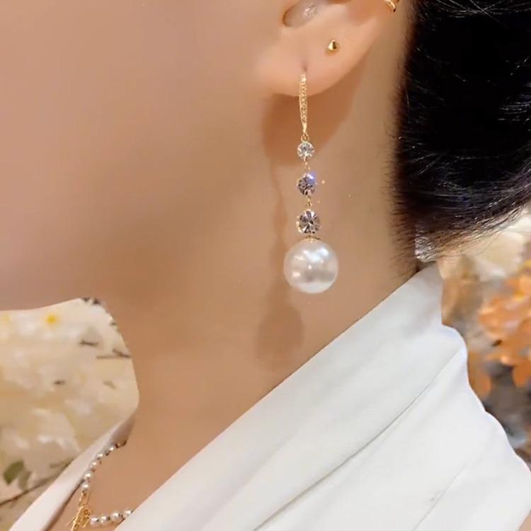 Элегантные серьги-подвески с жемчугом: Универсальный и Стройнящий для Женщин - Тренд 2025.