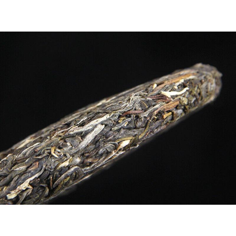 357г Пуэр из старого дерева Сырой чайный пирог Мэнхайский черный чай