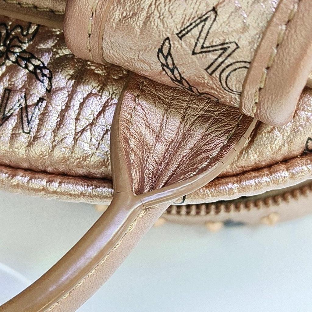 [Pre-Owned] Stark Mini Rose Gold Coated Canvas Monogram Studded Backpack - Very Good #X6O15I
