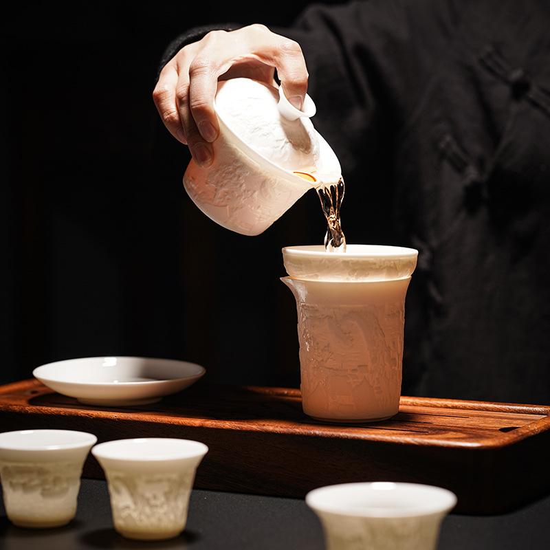 Suet jade relief Qingming Shanghetu Kung Fu tea set, a full set of home office gift boxes, business gifts