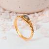 Delicate Gold Marquise Labradorite Ring: Vintage-style Ring with Ornate Filigree Band and Small Navette Gemstone.
