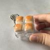 Push Button Anti-Stress Toy "Caramel Bread" Backpack Hanger, Plastic Finger Prank Office Toy