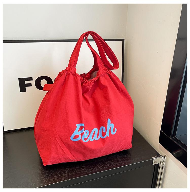 Нейлоновая сумка женская 2024 новая модная большая вместительная сумка через плечо подмышкой универсальная сумка для путешественников и студентов