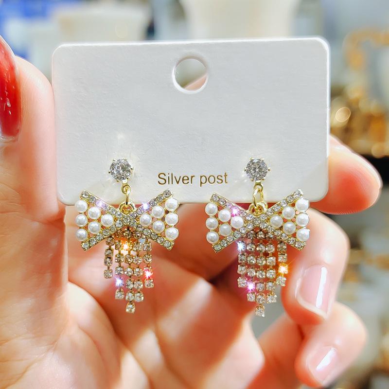 Серьги нового стиля, модные ювелирные изделия, инкрустированные прекрасным бантом, серьги с имитацией жемчуга, предотвращают аллергию