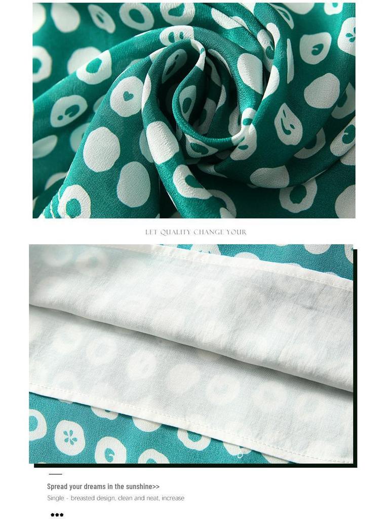 Шелковое платье средней длины в горошек