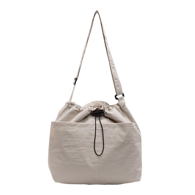 Новая летняя сумка-ведро большой вместимости с завязками на шнурке для женщин, японская повседневная сумка через плечо, уличная сумка для поездок на работу и обратно