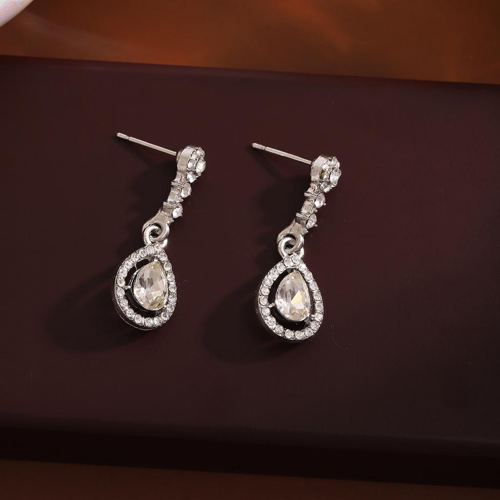 Мерцающие серьги-капли с ослепительными камнями циркона, минималистичные и универсальные