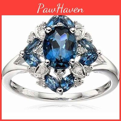 Изысканное посеребренное кольцо с натуральным синим сапфиром и потрясающими стразами