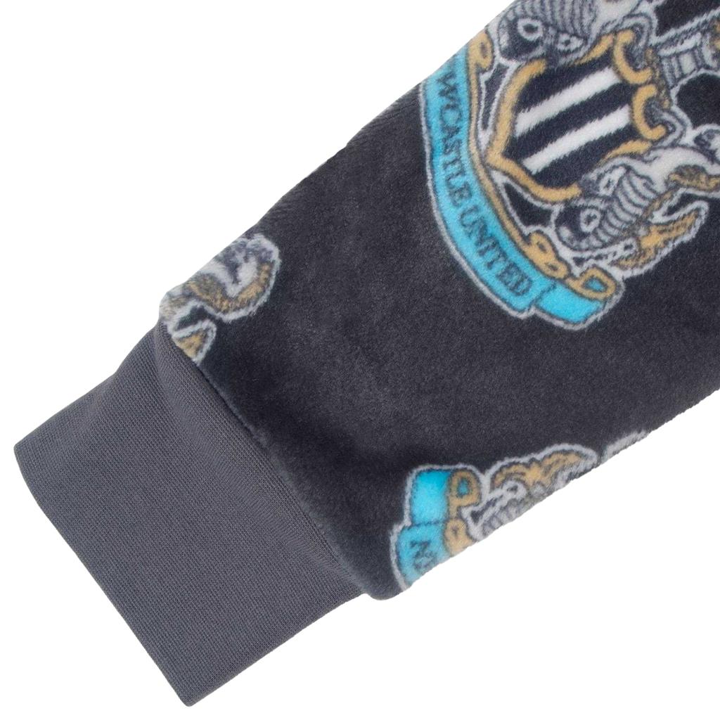 Newcastle United FC Childrens/Kids Crest Fleece All-In-One Nightwear